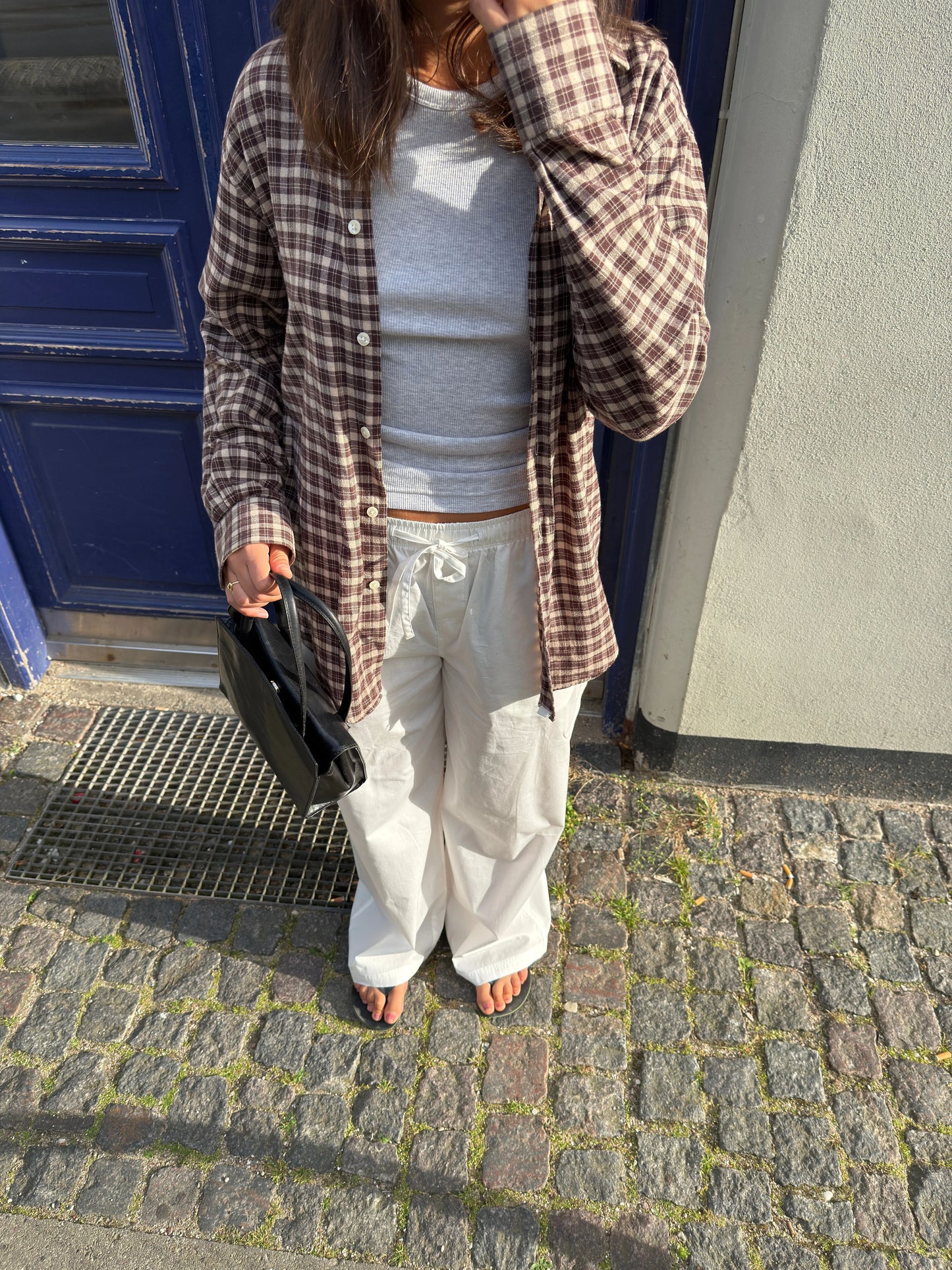 Katja är 170 cm lång och bär storlek M. | vit