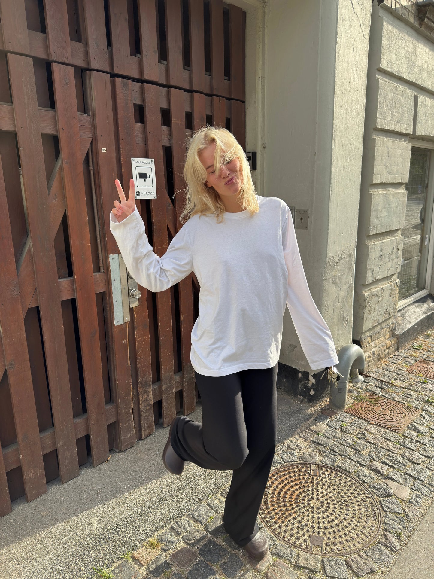 Sofie är 170 cm lång och bär storlek M. | vit