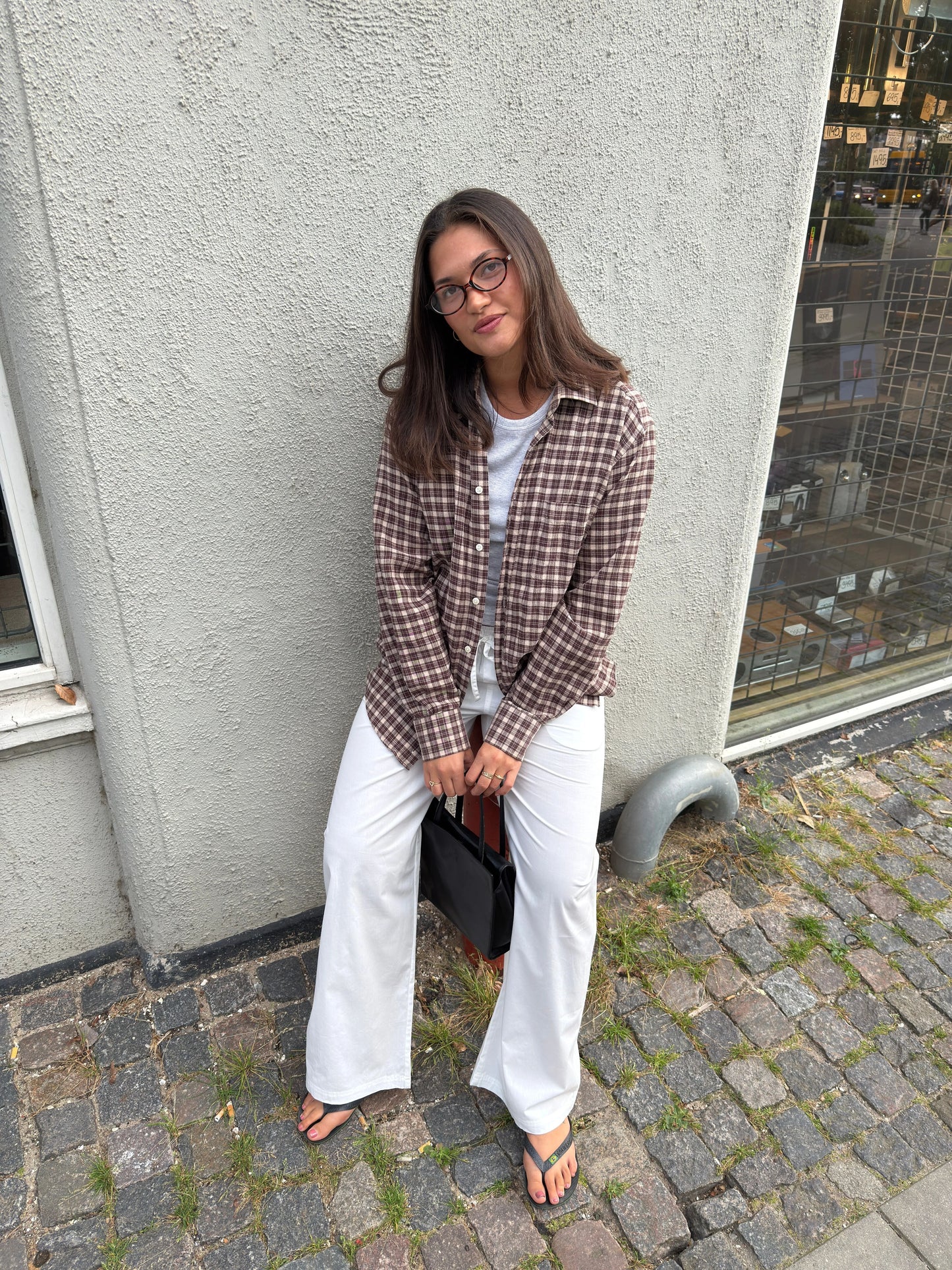 Katja är 170 cm lång och bär storlek M. | vit