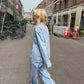 Sofie är 170 cm lång och bär storlek M.