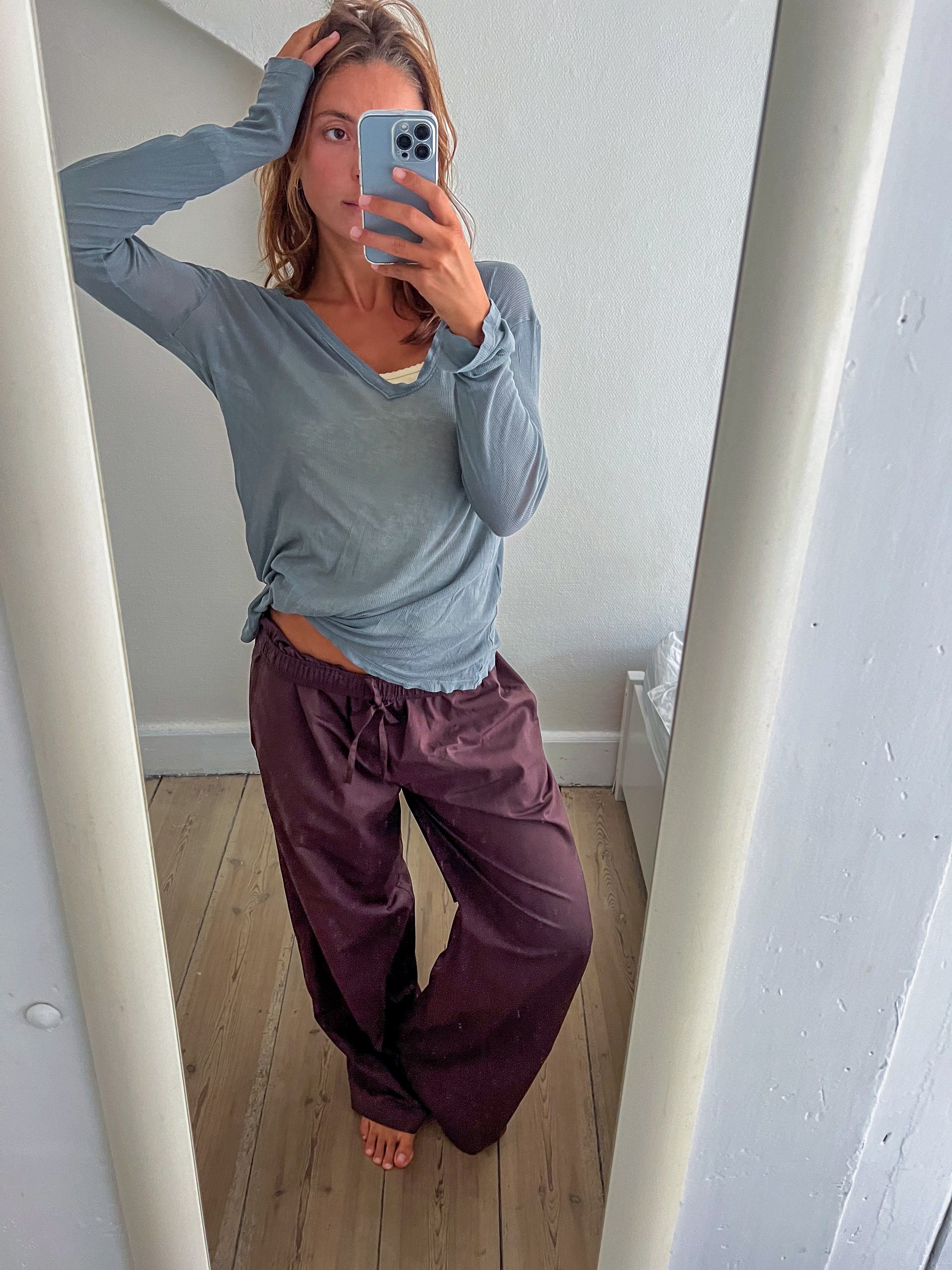 Sofie är 165 cm lång och bär storlek M. | mörkbrun