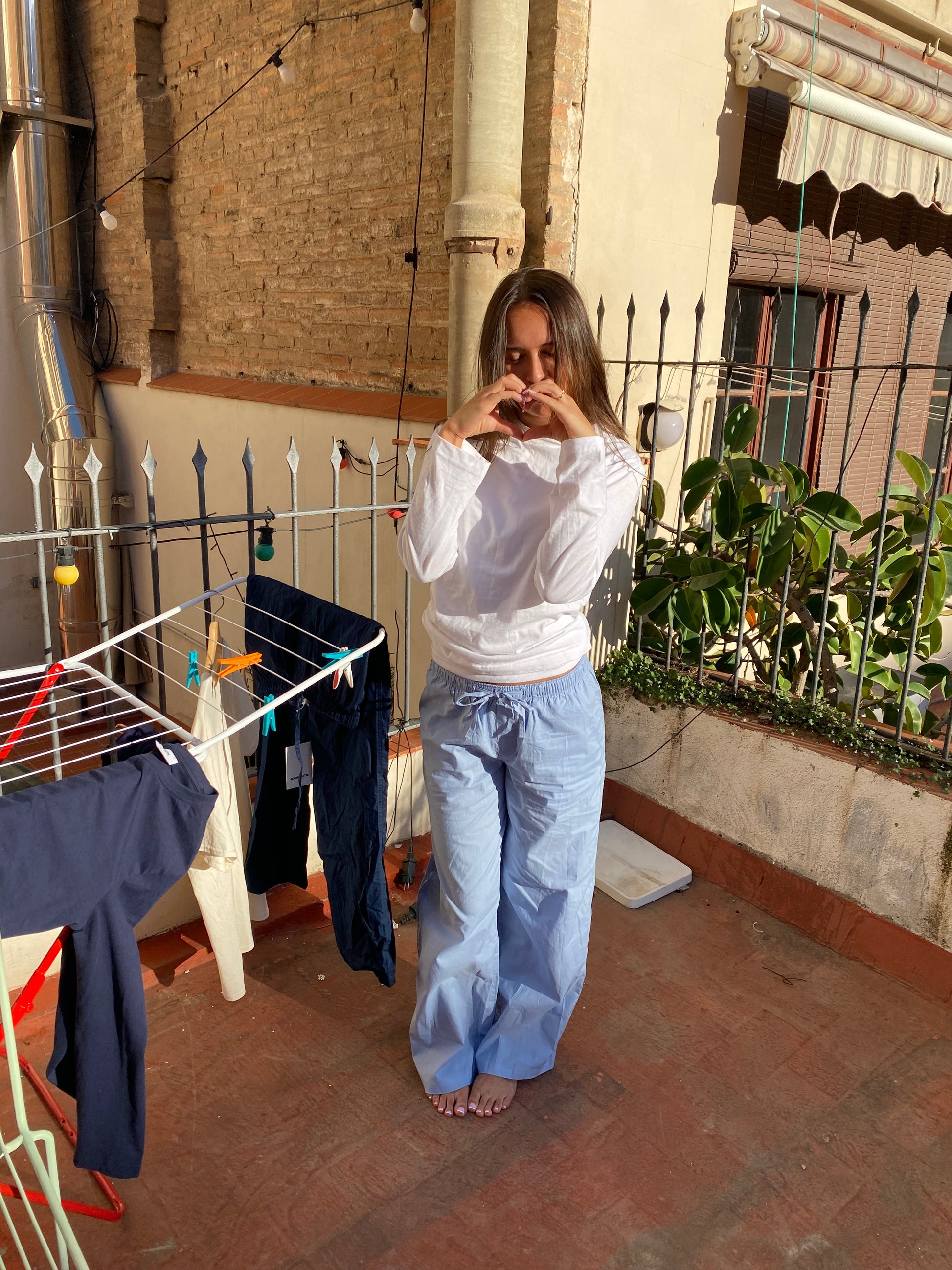 Nadia är 170 cm lång och bär storlek S. | vit