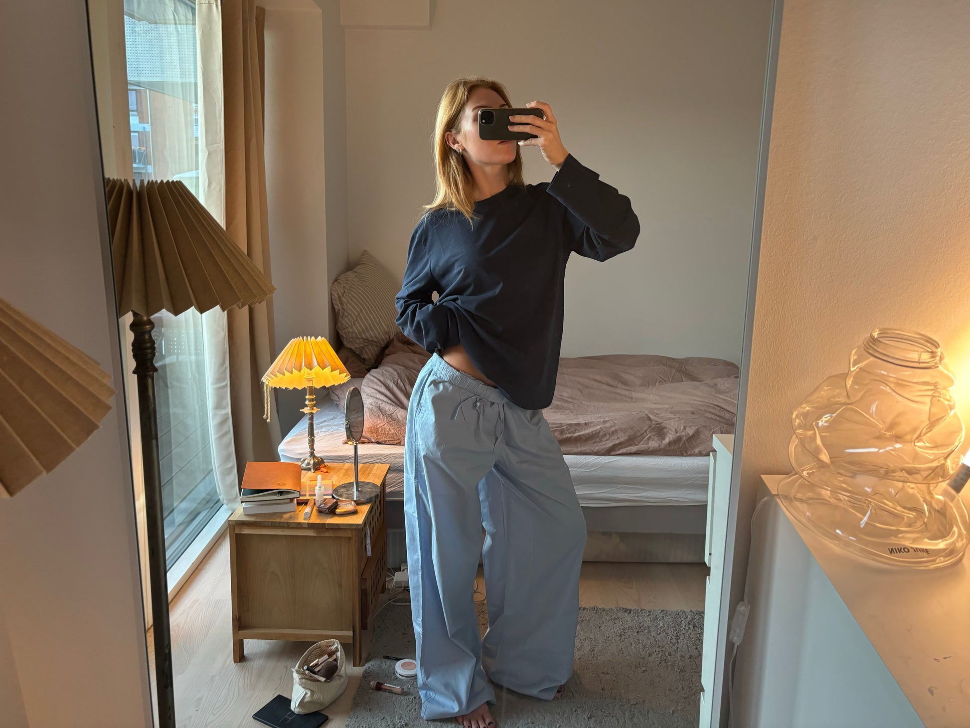 Herdís är 168 cm lång och använder storlek S.