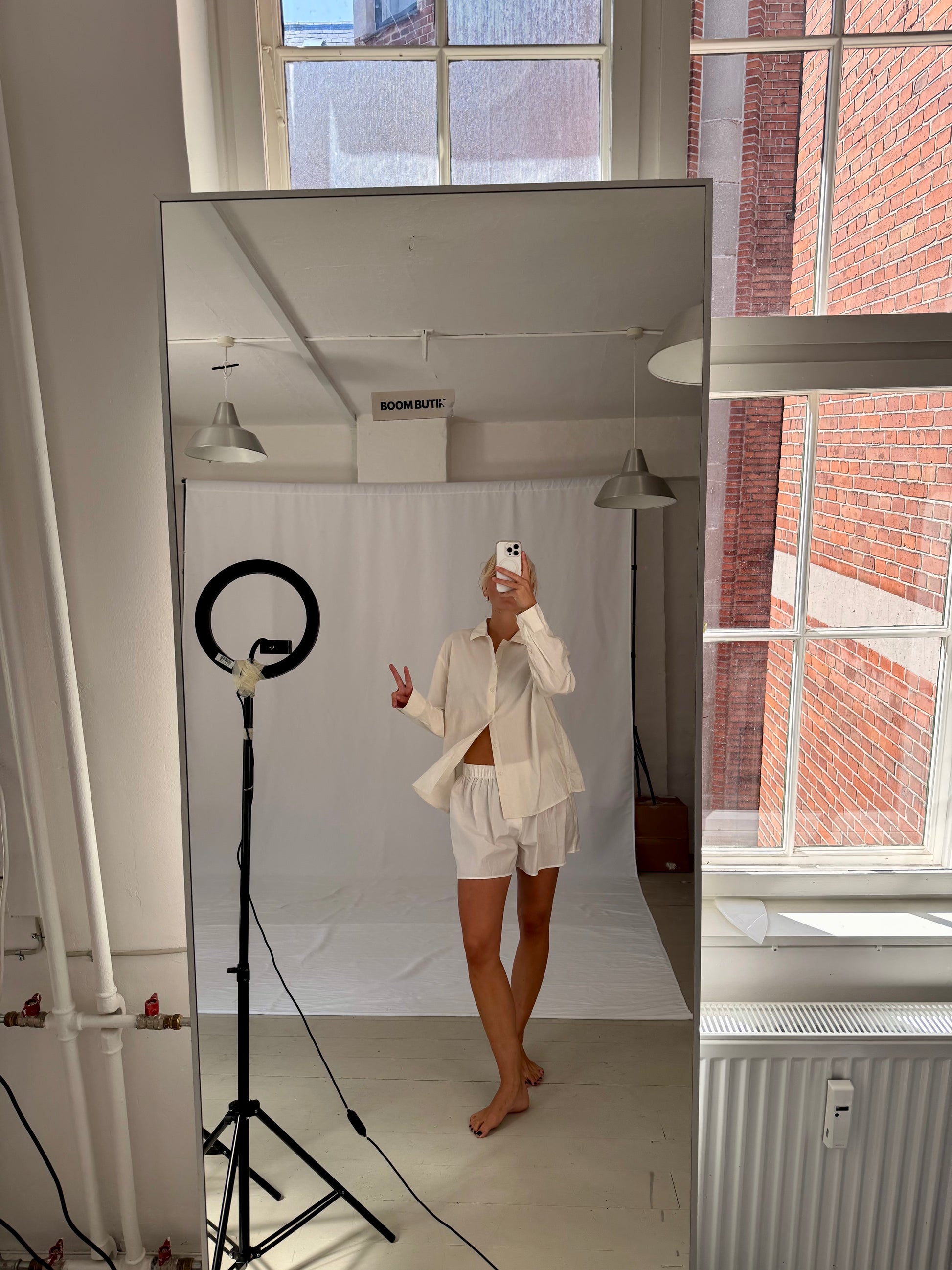 Sofie är 170 cm lång och bär storlek M. | vit