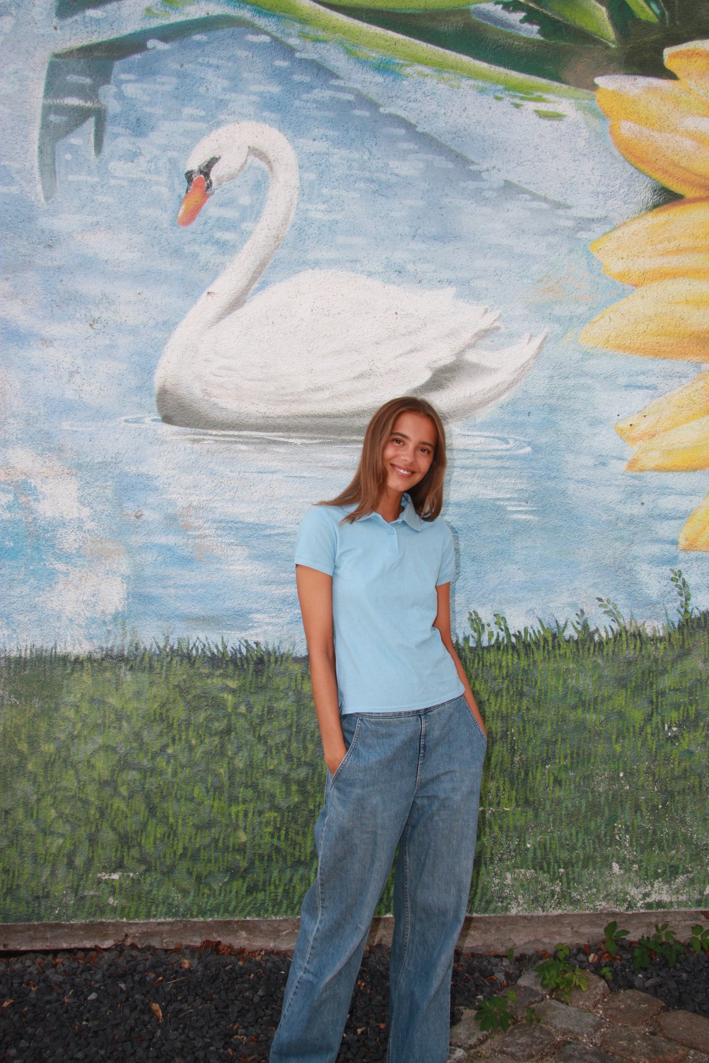 Sarah är 178 cm lång och bär storlek M. | ljusblå