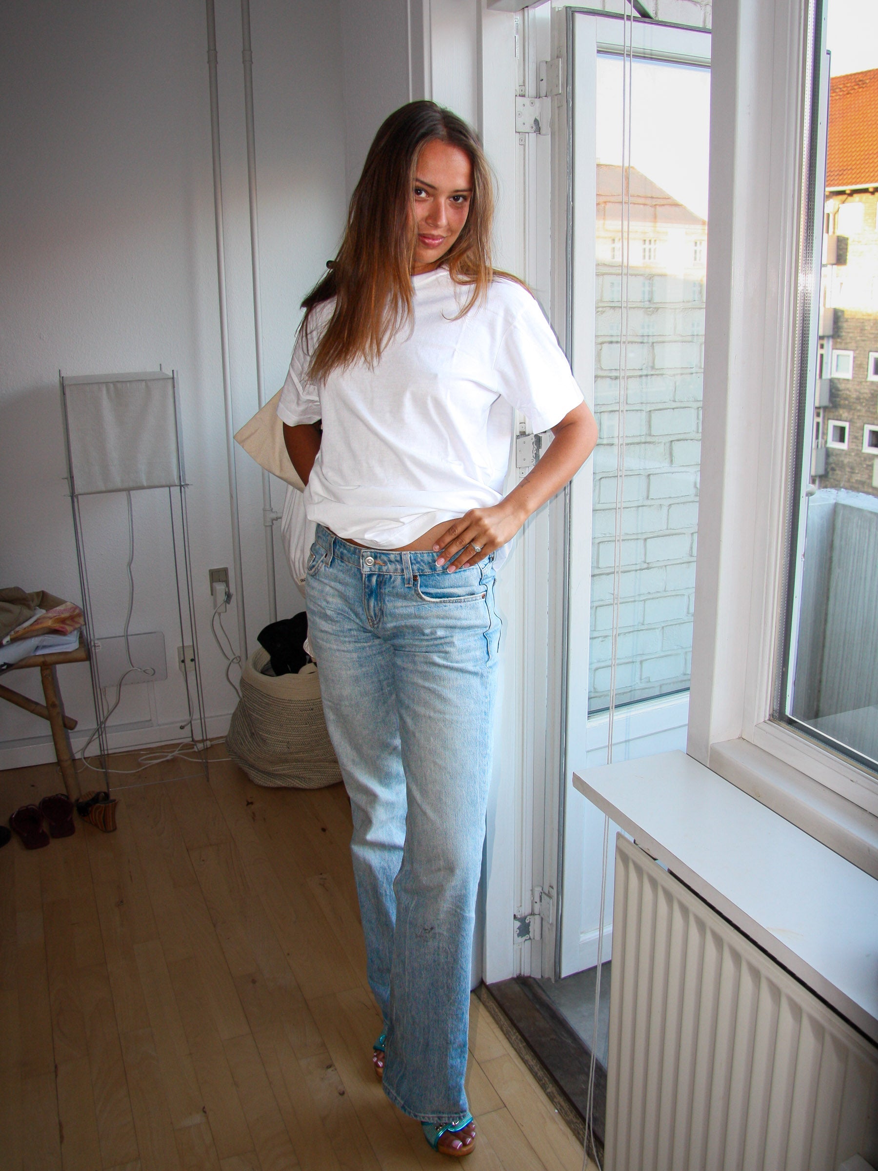 Nadia är 170 cm lång och bär storlek S. | vit